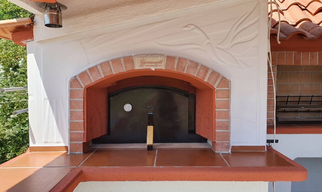 apertura forno modificata per teglie grandi